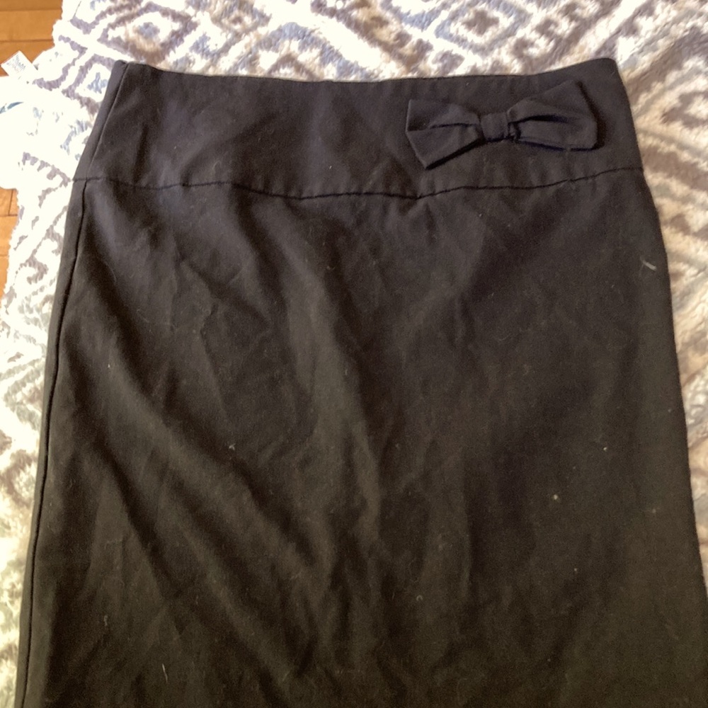 Gently used, black, bow tie skirt, 100% polyester